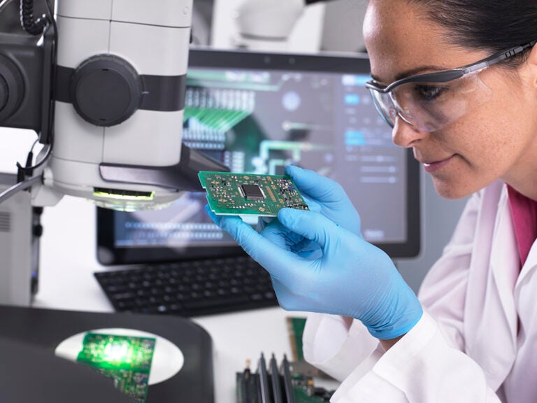 Engineer examines board quality to ensure good PCB design layout guidelines were incorporated.